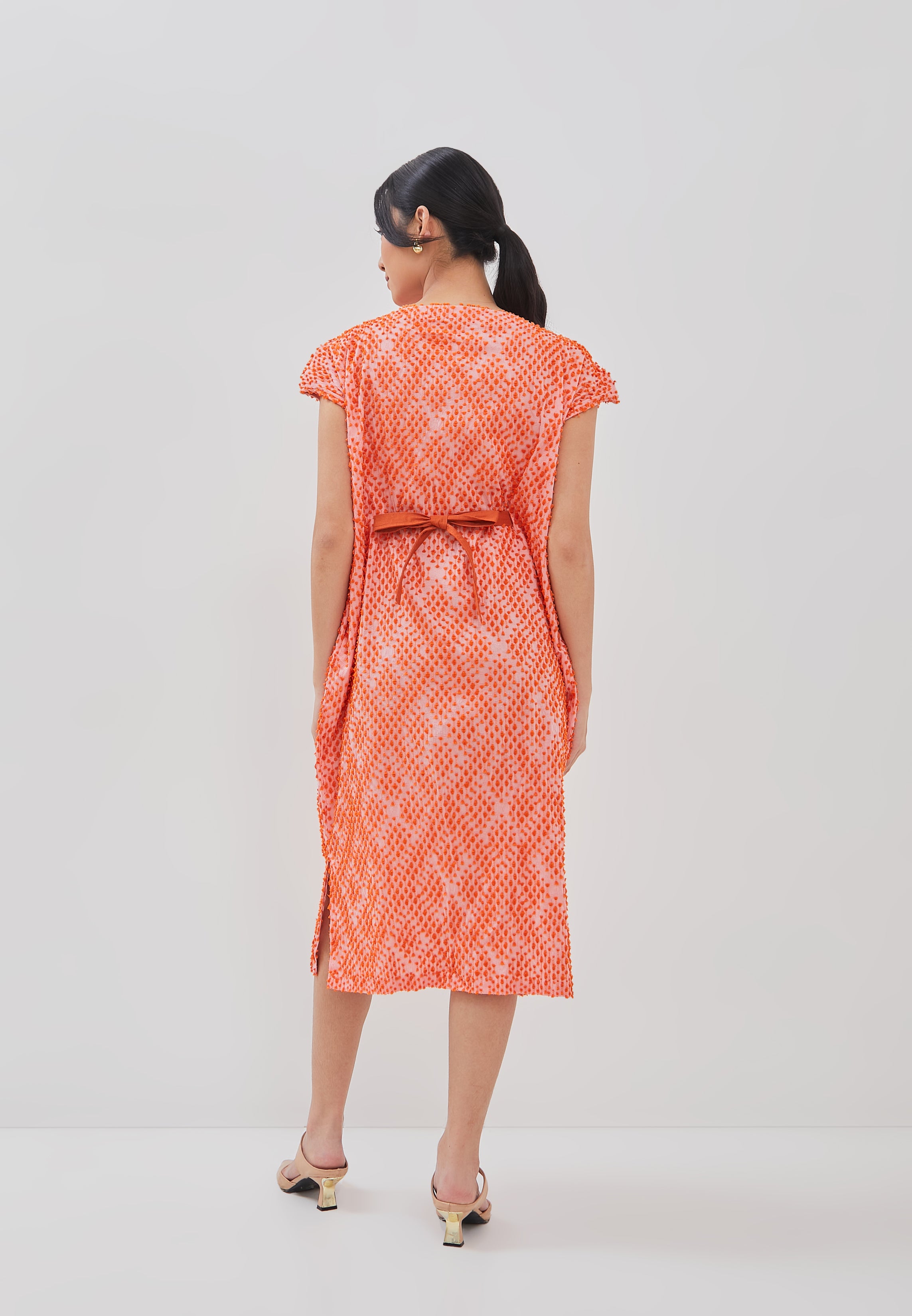 3D Tenun Orange Magic Dress
