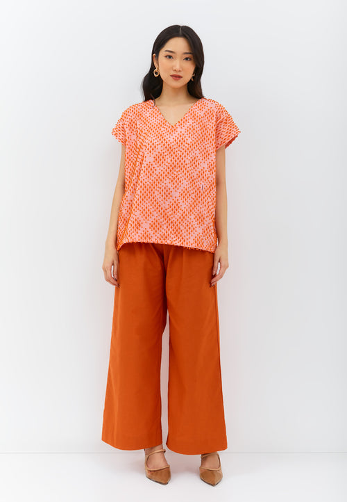 3D Tenun Orange Multiway Top